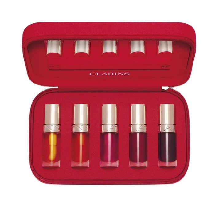 Clarins набір олійок для губ + клатч Lip Comfort Oil Collection