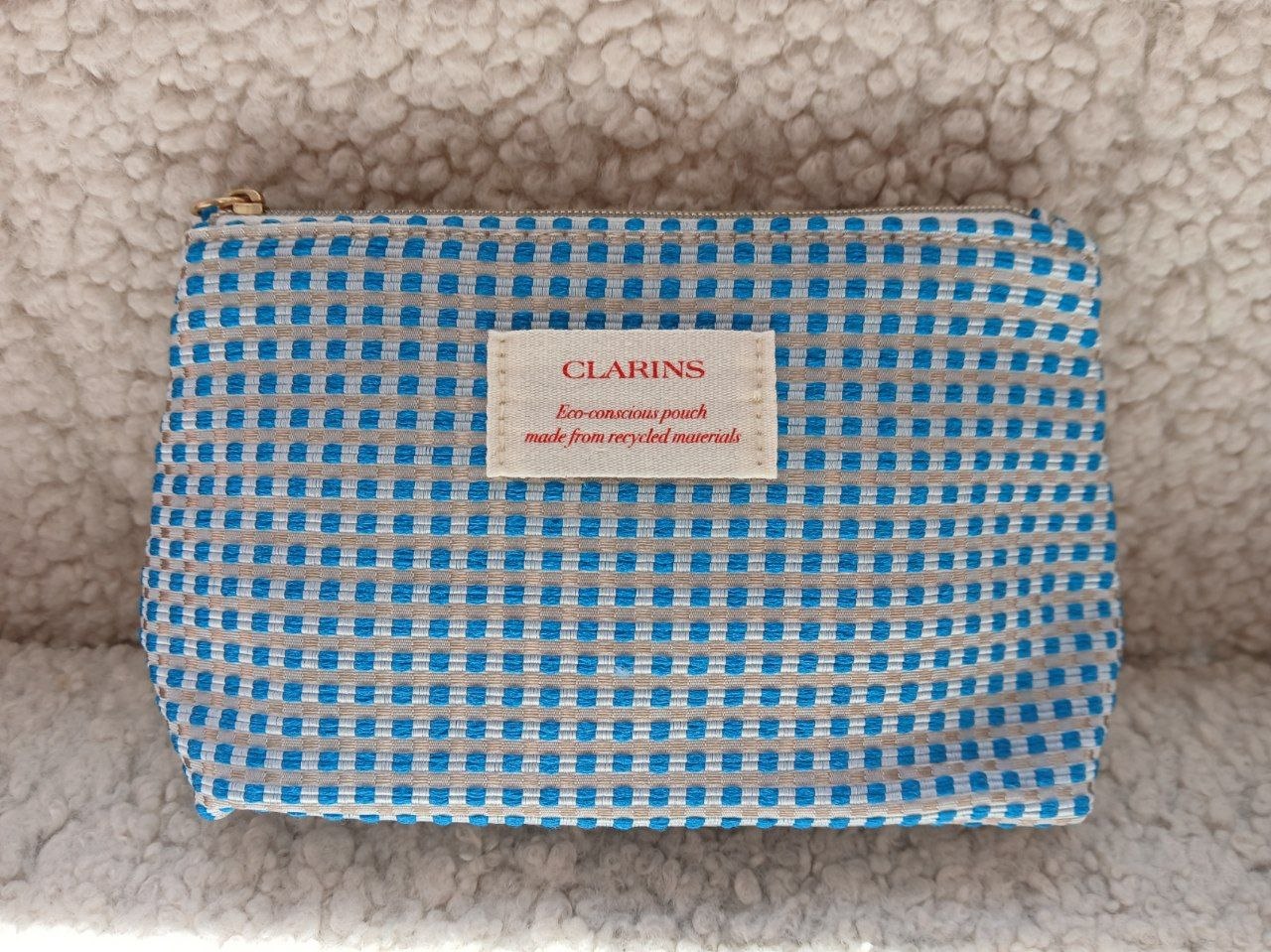 Clarins косметичка блакитна в клітинку